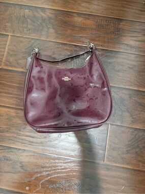 Coach Signature Embossed Hobo Bag in Burgundy